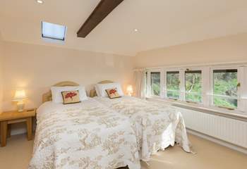This is the second bedroom - also with a fabulous view towards the farmstead and the valley beyond it.