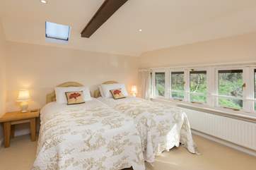 This is the second bedroom - also with a fabulous view towards the farmstead and the valley beyond it.