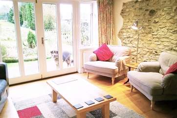 Another view of the living room - you can have the French windows wide open on a sunny day and enjoy watching all the bird life in the garden.