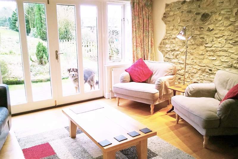 Another view of the living room - you can have the French windows wide open on a sunny day and enjoy watching all the bird life in the garden.