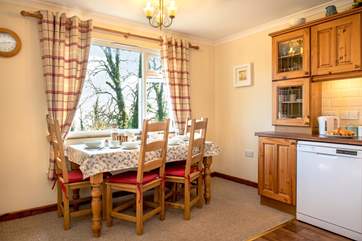 The kitchen/dining-room, where you can enjoy more of those wonderful views.