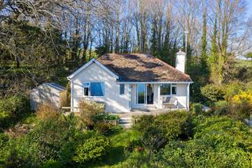 Maryland is set in a mature garden overlooking the valley and Talland Bay beyond.