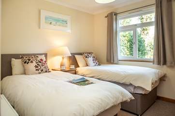 Twin beds in bedroom 2.