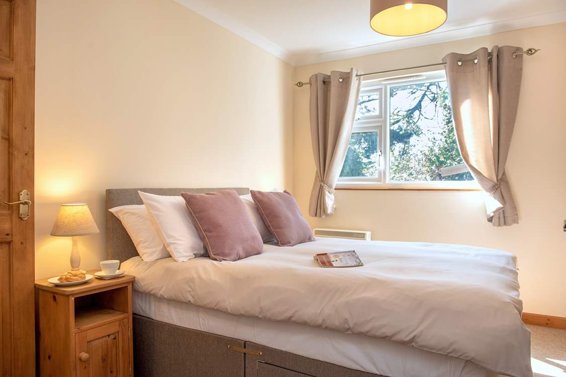 Bedroom 1 has a super comfy double bed.