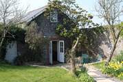 Fig Tree Cottage sits in a walled garden and is very private and sunny.