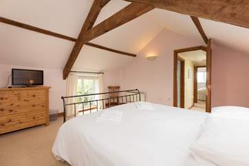 You can have the luxury of lying in bed watching TV!