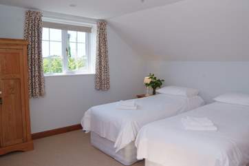 The twin bedroom has 'zip and link' beds and so can be made up as twins or as a super-king double.