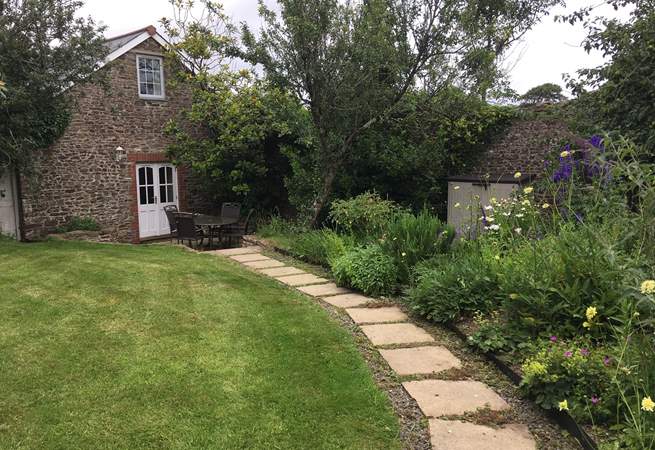 Fig Tree Cottage is in its own private walled garden, a magical place to rewind after a day of exploring. 