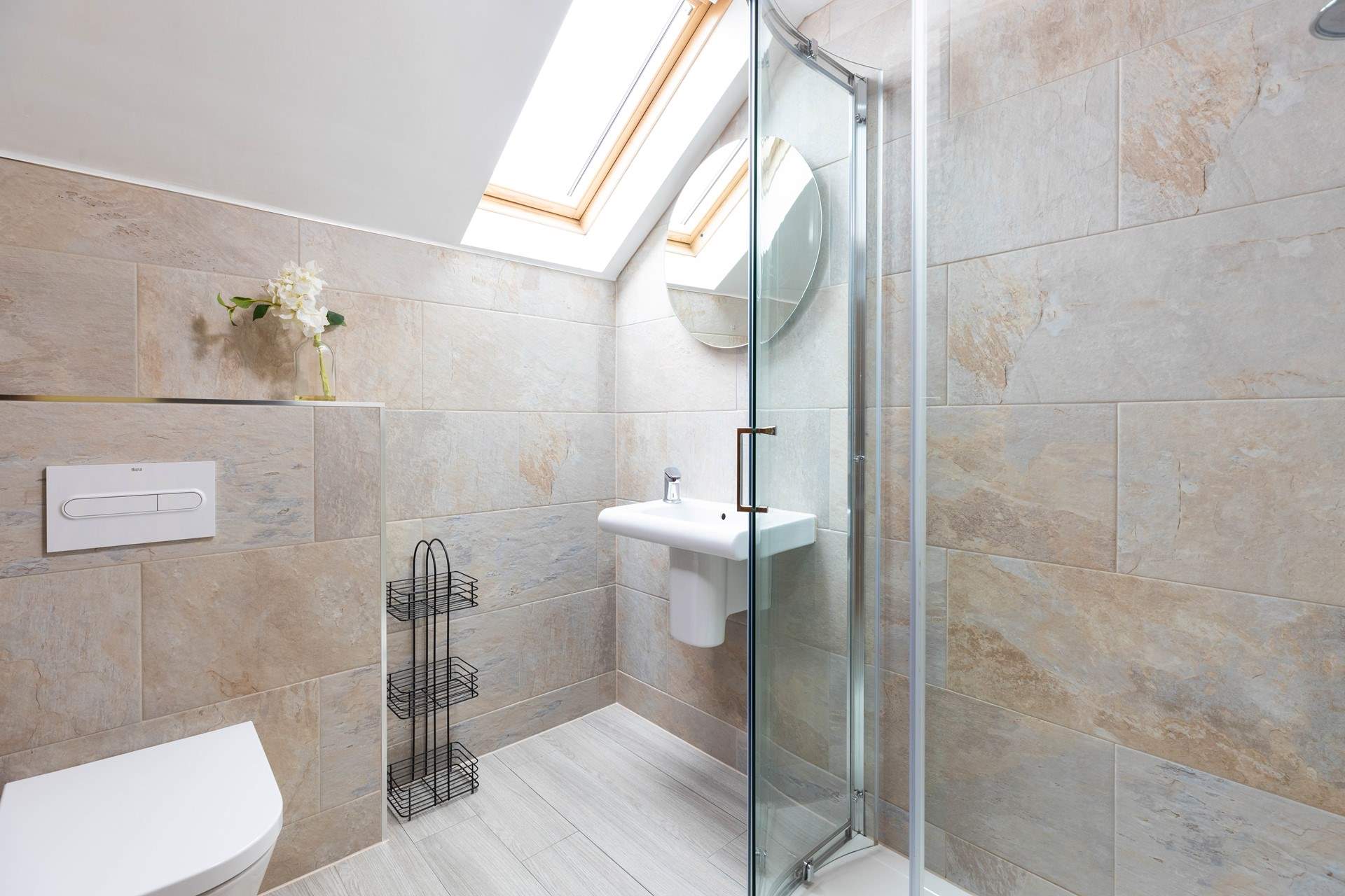 The lovely bright contemporary shower-room.
