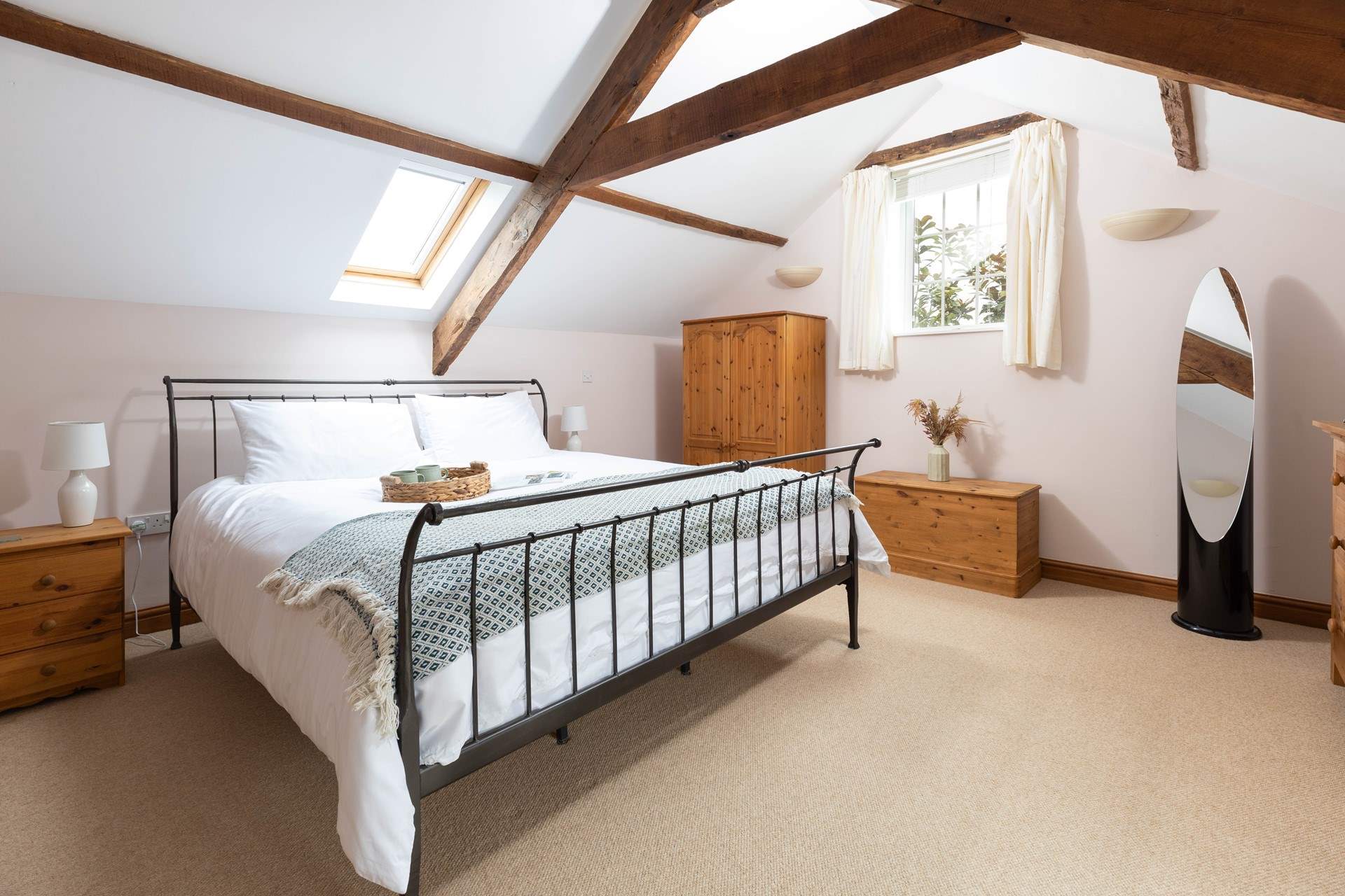 The bedrooms and bathrooms are on the first floor. This is the master bedroom with its super-king size bed.