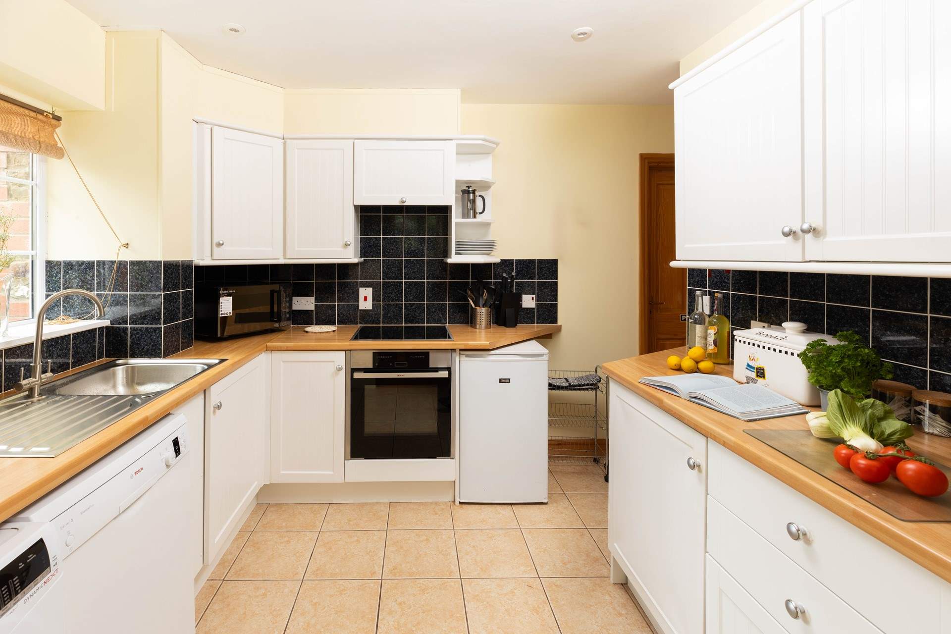 The kitchen is a very practical and open space.