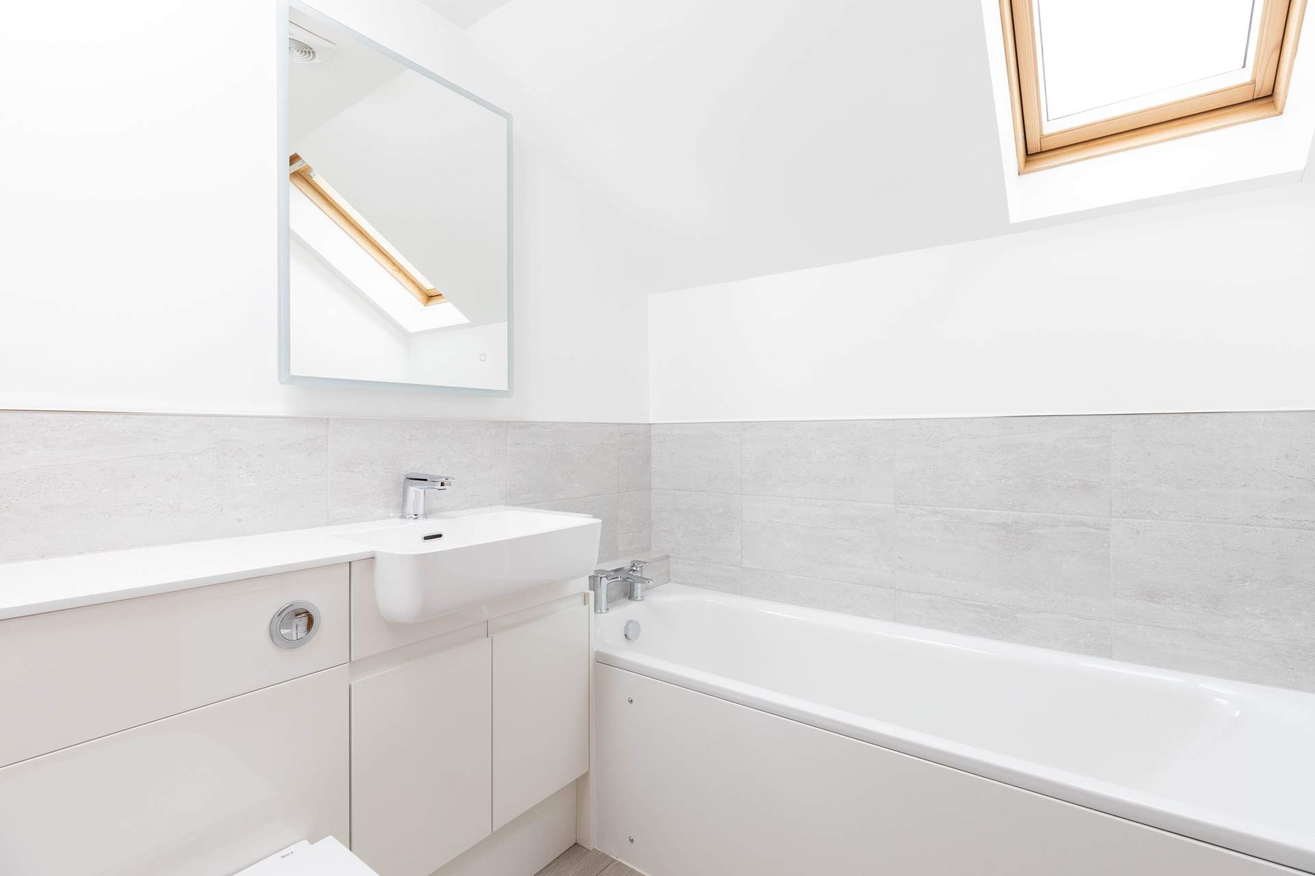 Enjoy a leisurely soak in the modern bathroom.