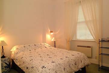 The bedroom is light and fresh.
