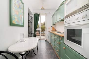 The fitted kitchen-area leads out onto the patio.