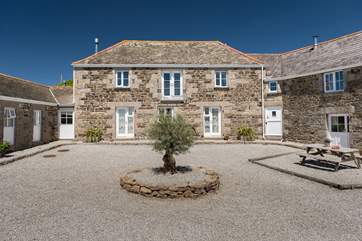 The rear of Wallis Barn faces onto the shared courtyard.