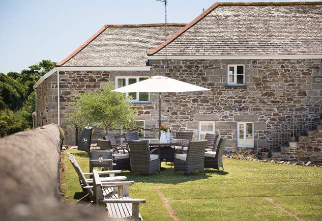 Enjoy a relaxing meal in the large garden at Wallis Barn.