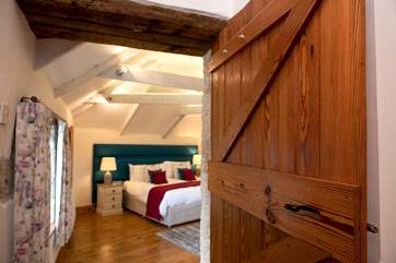 The master bedroom has 'zip and link' beds on the first floor.