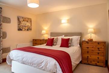 This bedroom has a king-size bed and en suite shower-room (Bedroom 2).