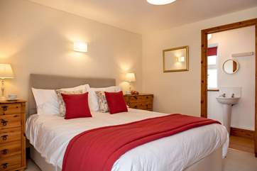 This bedroom has lovely warming tones.