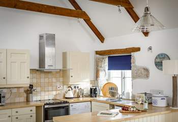 The well equipped kitchen is open plan with the dining and living space and has all you'll need.