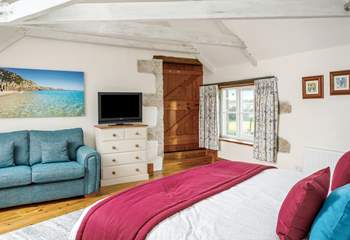 The master bedroom on the first floor really has the 'wow' factor with a hand made super-king bed (Bedroom 1).