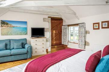 The master bedroom on the first floor really has the 'wow' factor with a hand made super-king bed (Bedroom 1).