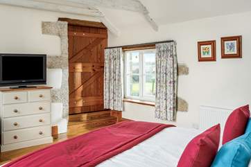 The master bedroom on the first floor has beautiful countryside views.
