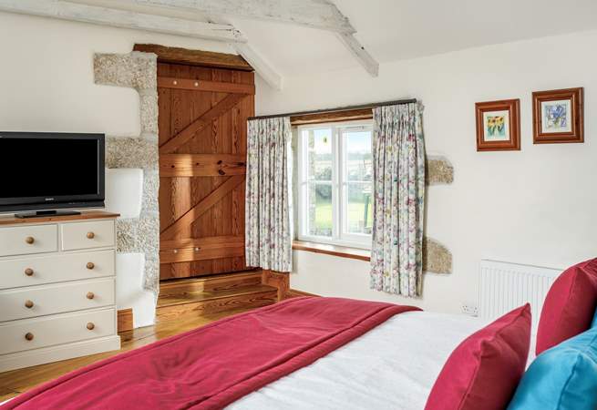 The master bedroom on the first floor has beautiful countryside views.
