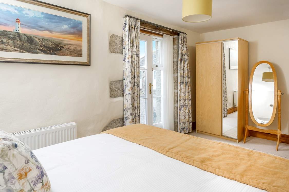 Bedroom 4 with a king-size bed is a delight.