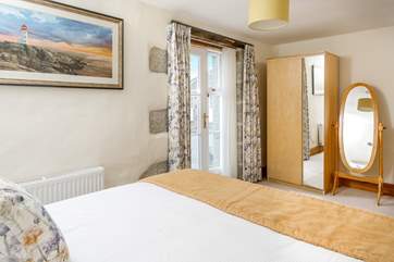 Bedroom 4 with a king-size bed is a delight.