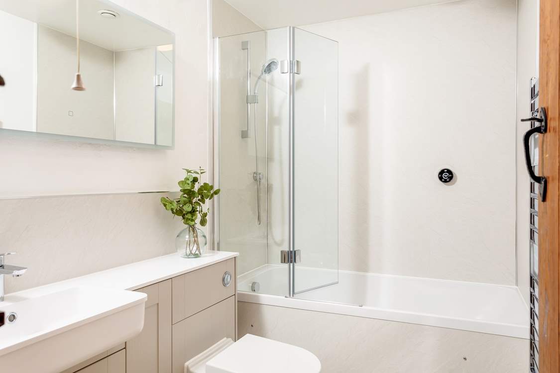 The stylish bathroom on the first floor is next door to bedroom 1.