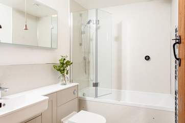 The stylish bathroom on the first floor is next door to bedroom 1.