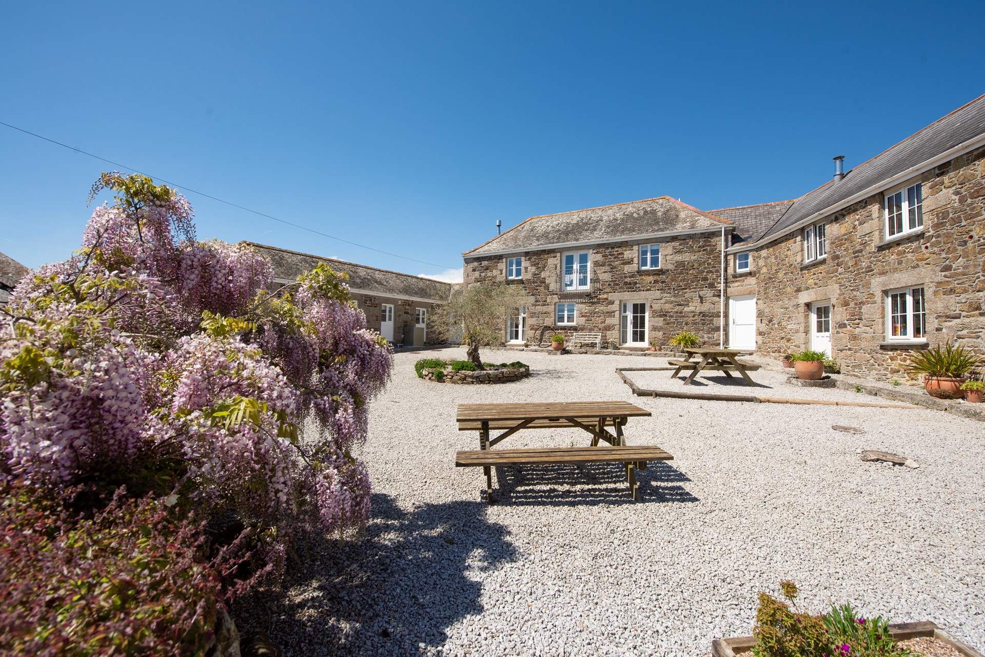 The rear of Wallis Barn faces onto the shared courtyard.