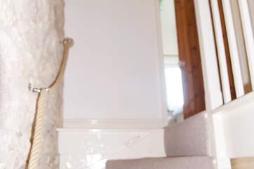 Please note there is a steep and narrow stairway which leads from the kitchen to the bedrooms above.