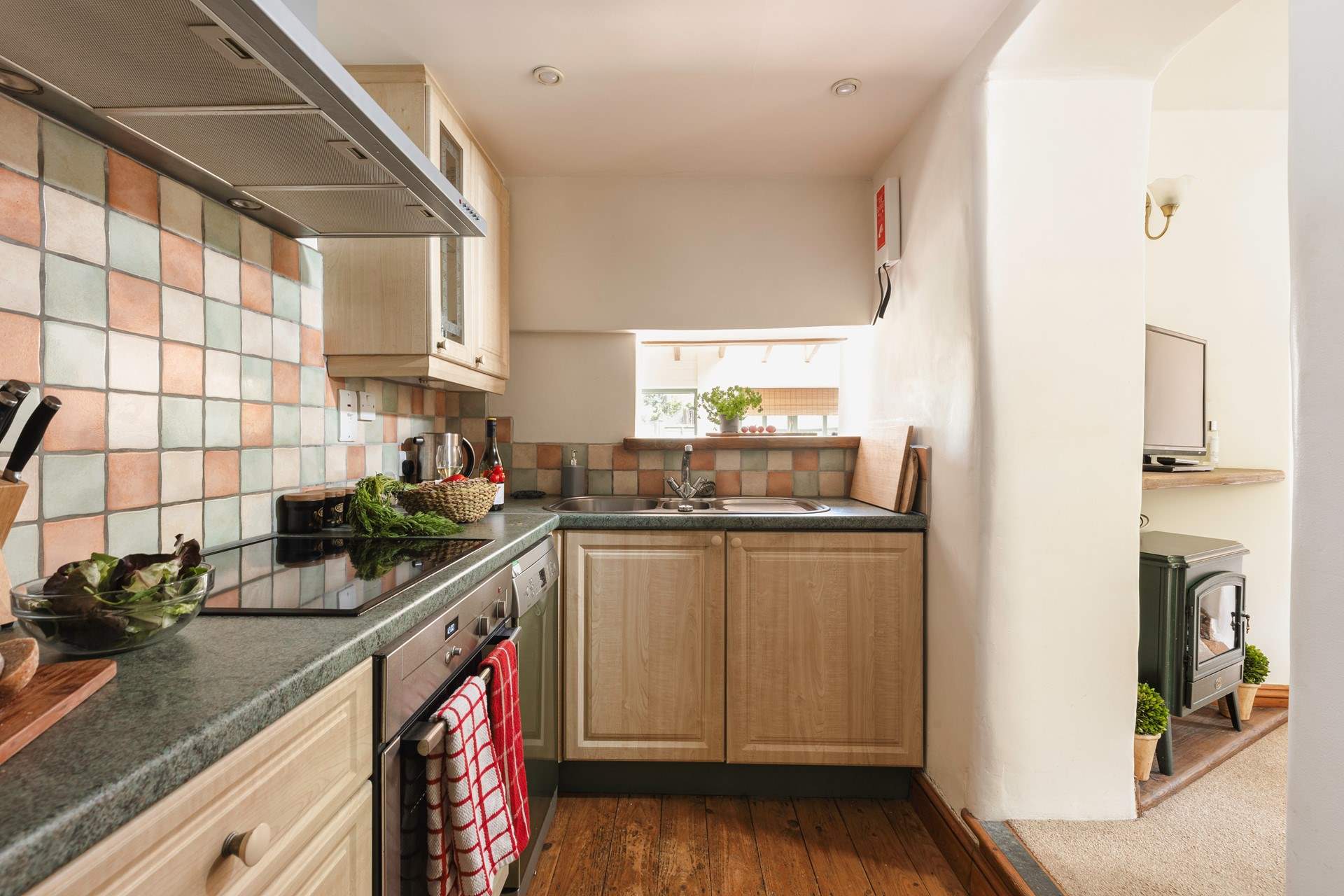 Cook up a holiday feast in the well equipped kitchen with the sitting-room just next door.
