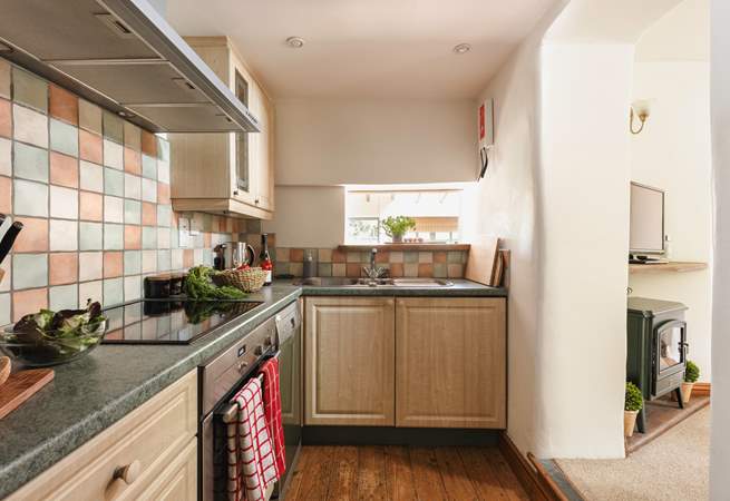 Cook up a holiday feast in the well equipped kitchen with the sitting-room just next door.