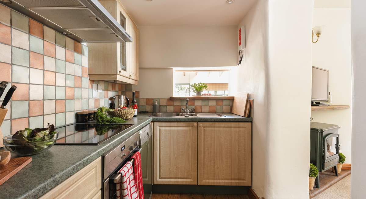 Cook up a holiday feast in the well equipped kitchen with the sitting-room just next door.