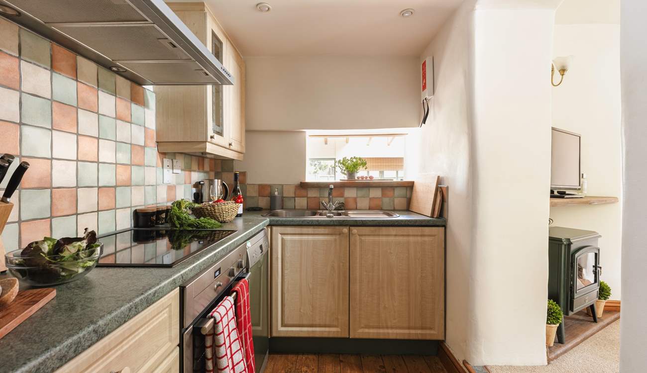 Cook up a holiday feast in the well-equipped kitchen with the sitting-room just next door.