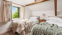 Bedroom 2 has twin beds perfect for adults or children.