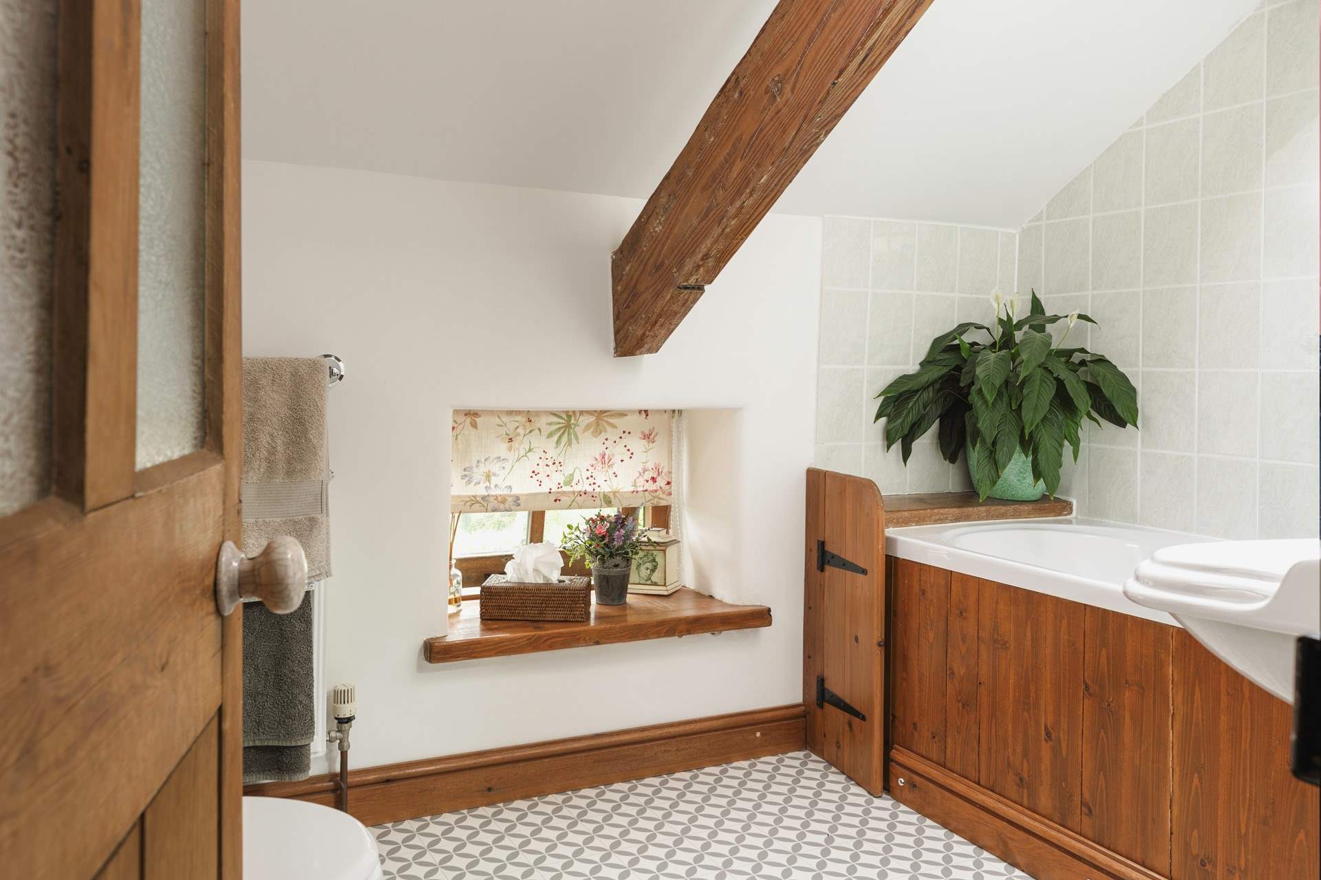 The bathroom has some lovely features.