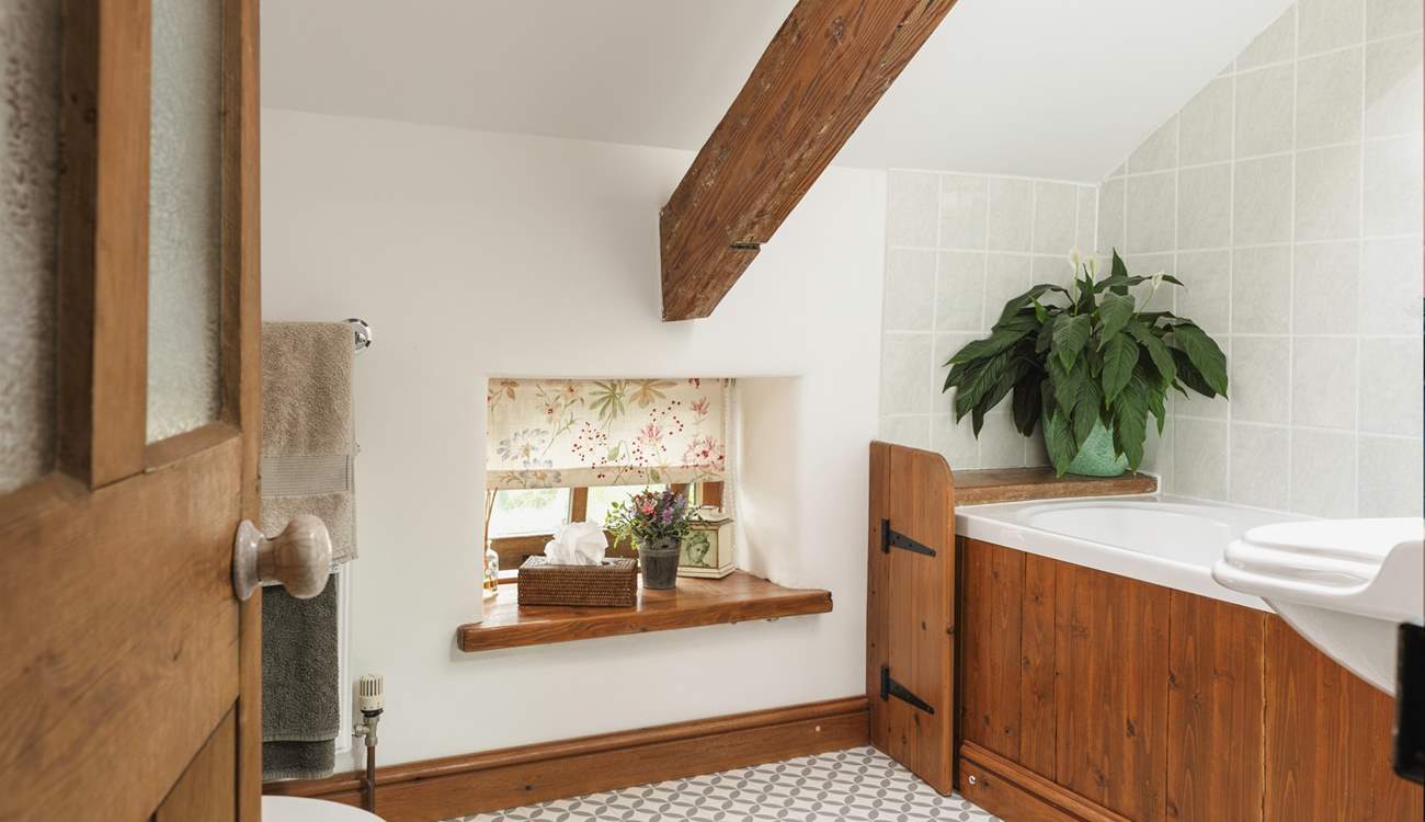 The bathroom has some lovely features.