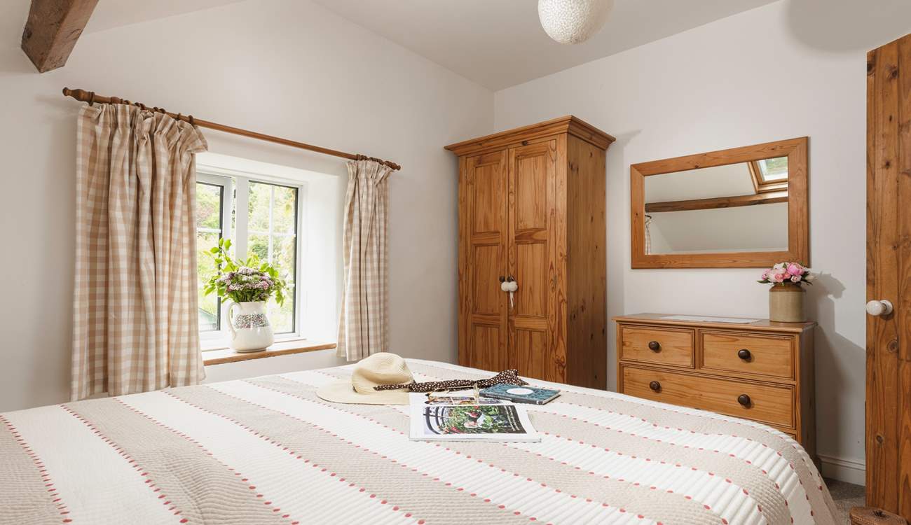 Bedroom 1 has a comfy king-size bed.