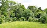 You are welcome to use this part of the owner's garden which leads to a beech wood, especially useful if your four-legged friend needs to stretch their legs! The garden is accessed via 5 steps. - Thumbnail Image