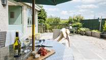 The outside space is perfect for al fresco dining.