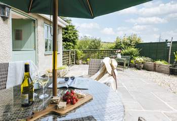 The outside space is perfect for al fresco dining.