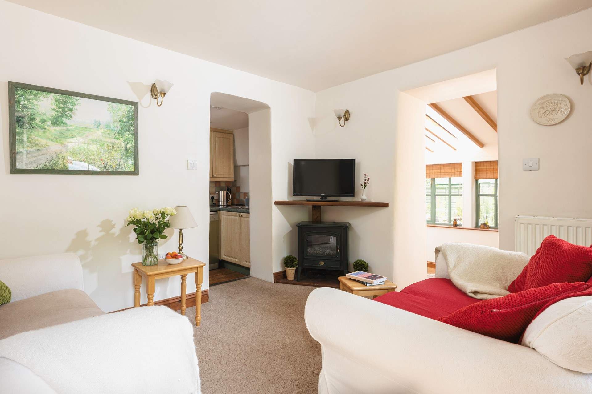 The sitting-room has a  wood-burner effect electric stove for those chillier evenings.