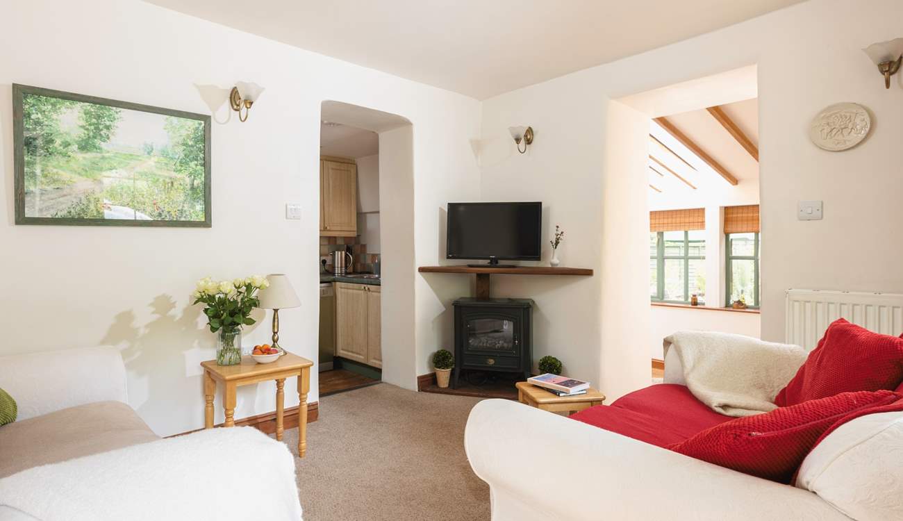 The sitting-room has a  wood-burner effect electric stove for those chillier evenings.