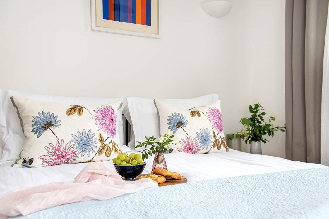 A king-size bed awaits in bedroom one