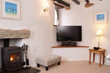 A roaring wood-burner in each sitting-room makes this cottage cosy and warm.