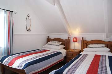 The twin bedroom (Bedroom 2) has views to the sea.